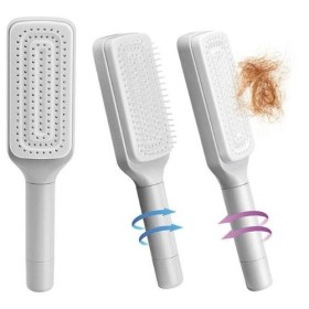 فرشاة الشعر اليدوية